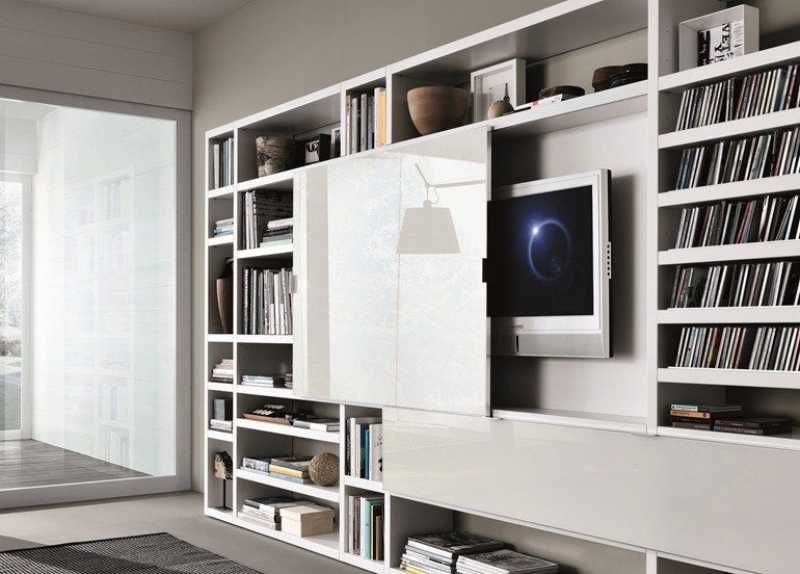 Mueble del salón para ocultar la televisión con almacenamiento adicional.