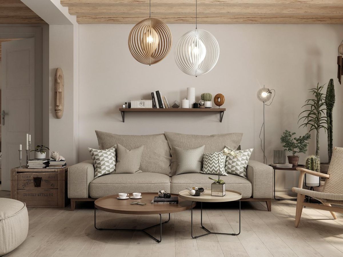 Salón ecléctico con decoración beige de distintas épocas.