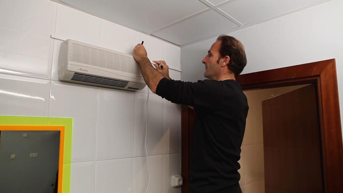 Cómo instalar un calefactor eléctrico de pared paso 8
