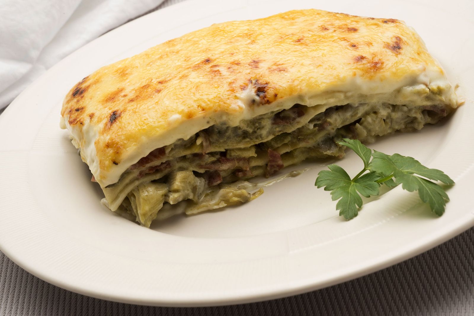 6149 1 Lasaña de alcachofas con jamon xl