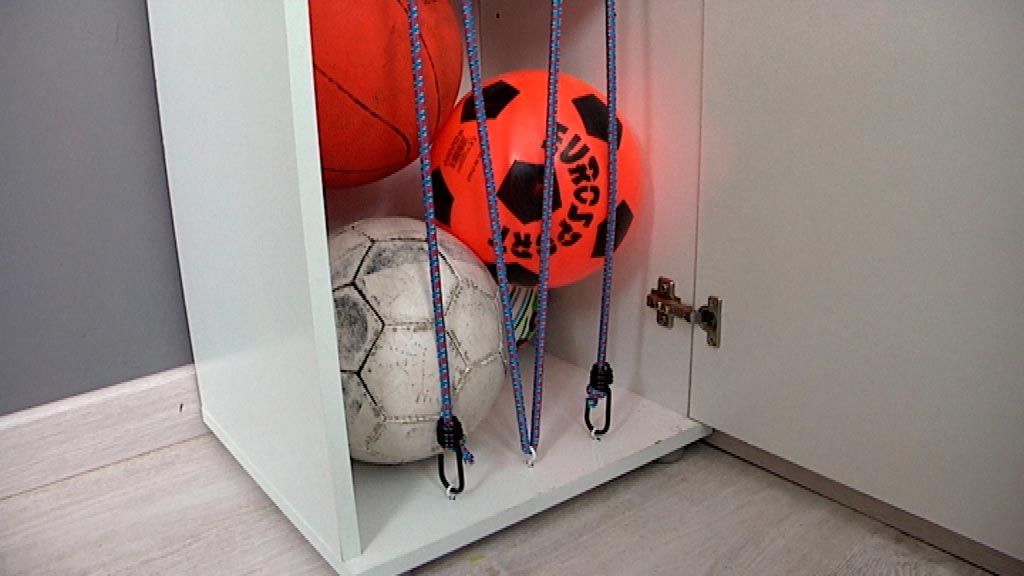 Mueble para balones paso 8