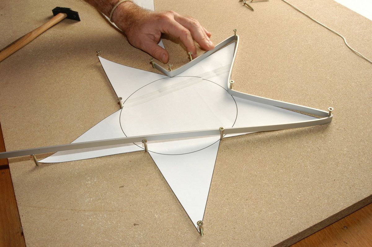 Estrella con tubo luminoso paso 2