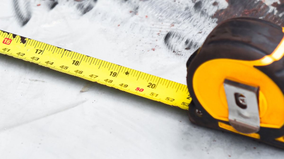 Símbolo de diamante en una cinta métrica