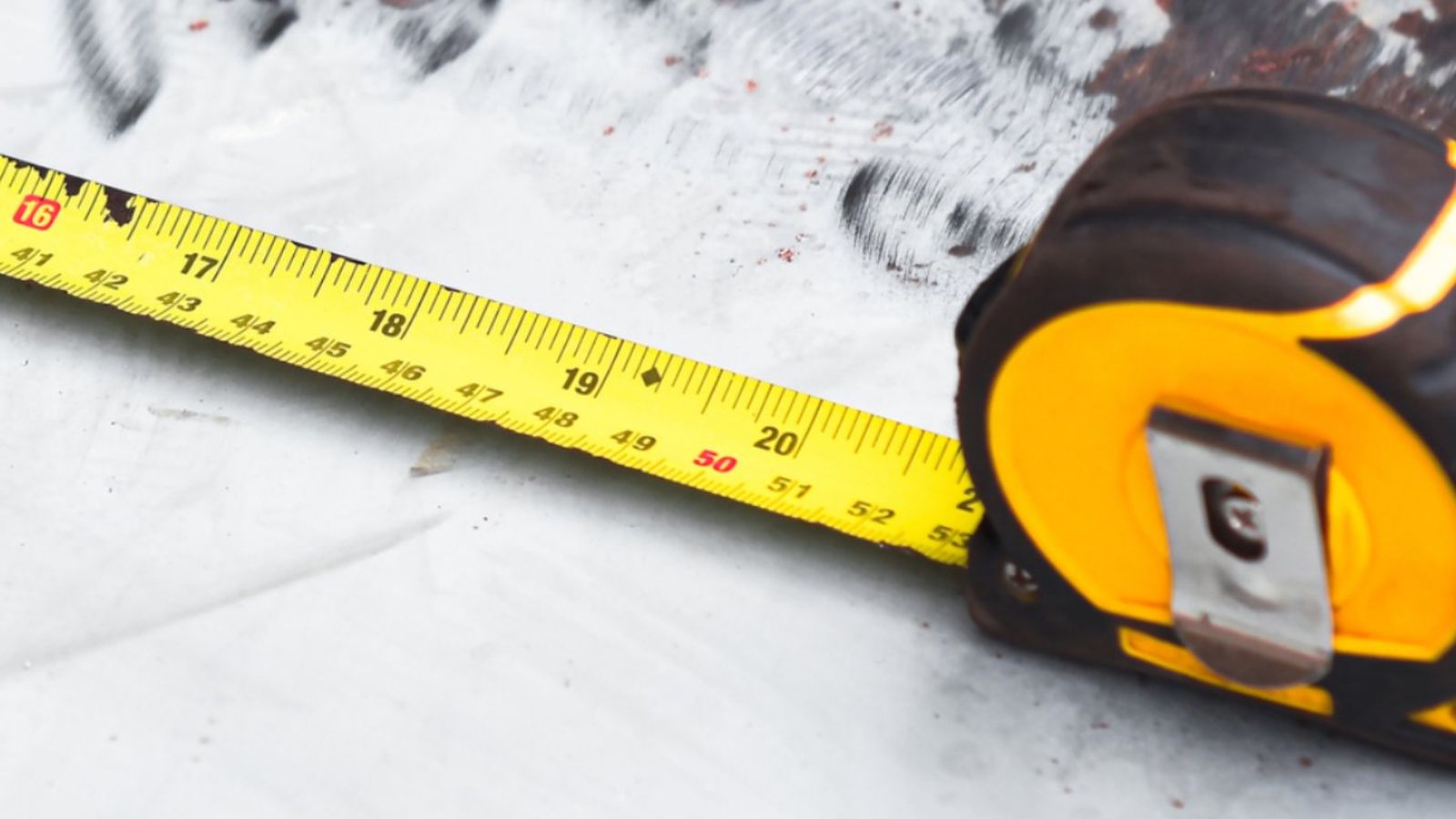 Símbolo de diamante en una cinta métrica