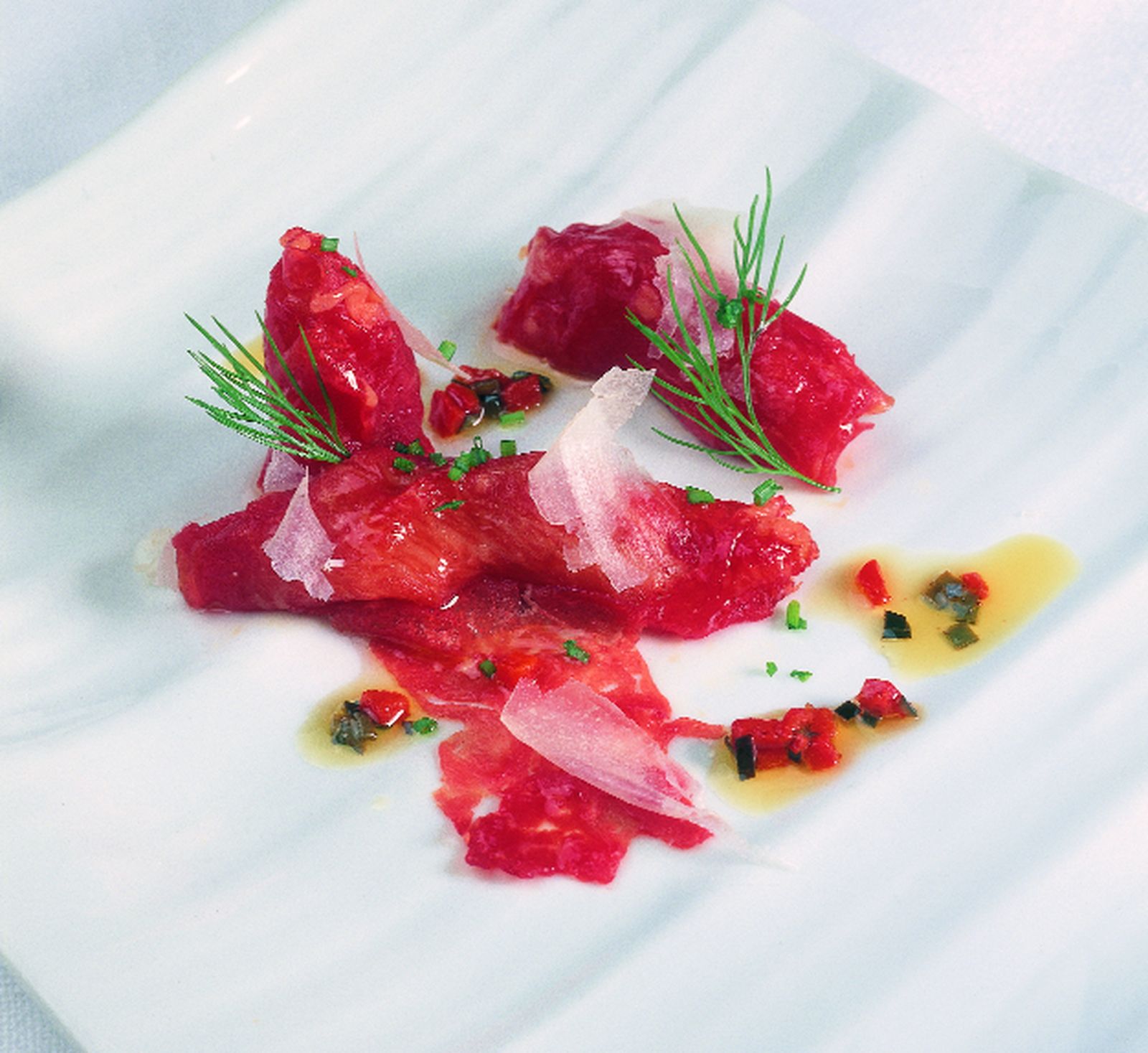 Carpaccio de ternera con crema de membrillo y vinagreta agridulce