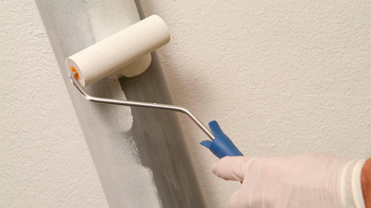Pintar la bajante de la tubería paso 5