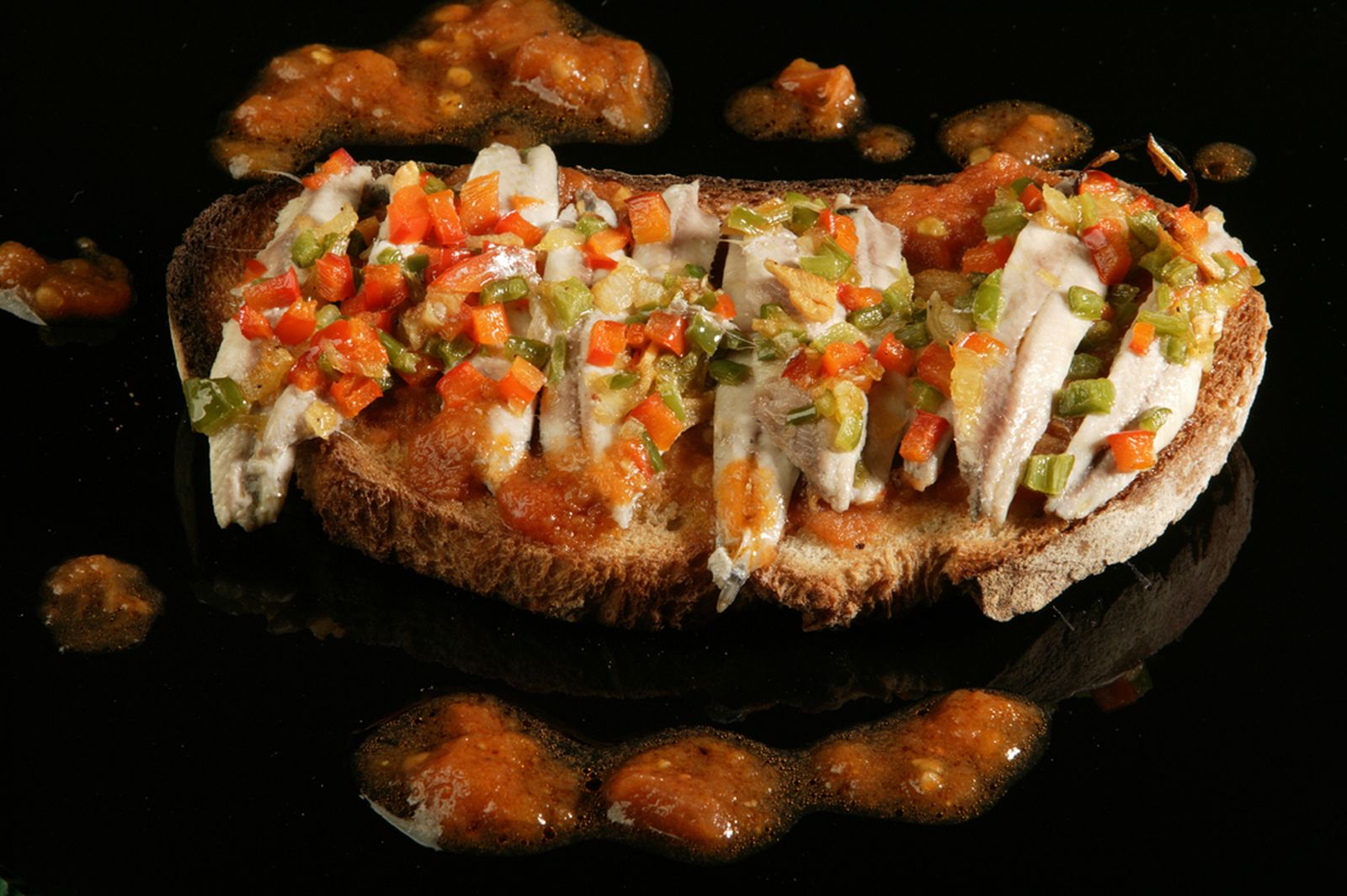 Tostadas con antxoas >