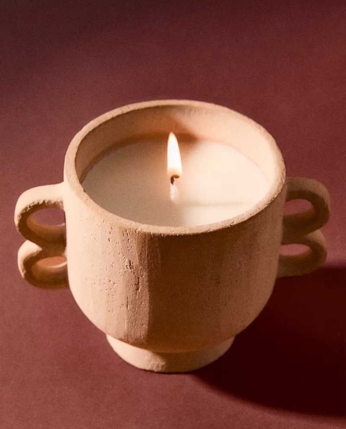 Vela aromática flor de Noviembre de estilo rústico.