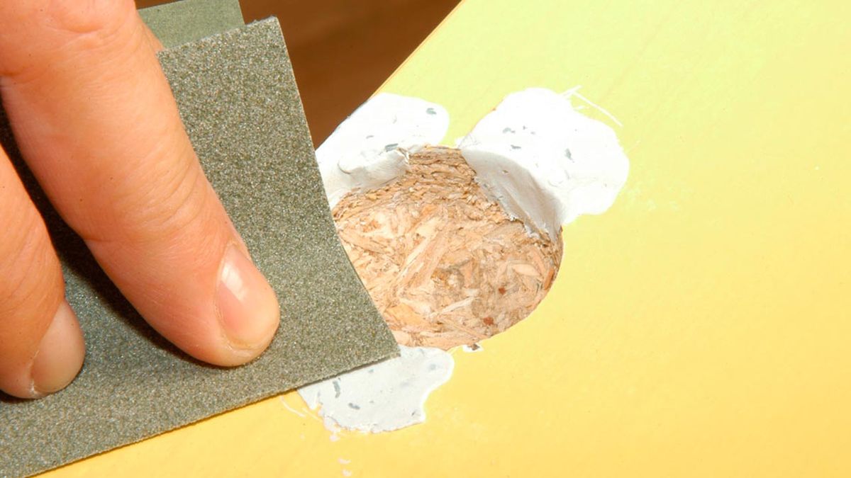 Arreglar la bisagra de los muebles de la cocina paso 5