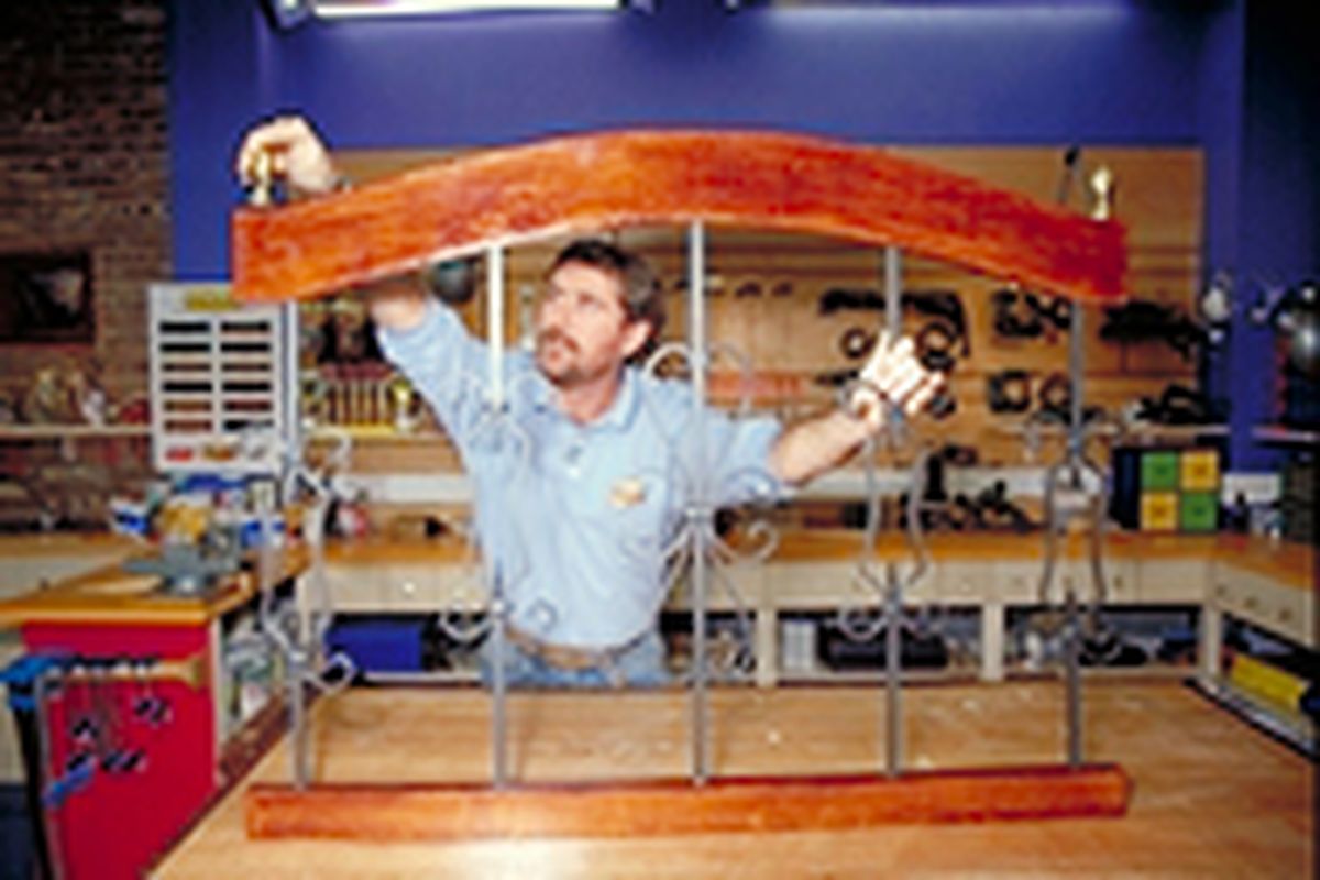 Cabecero de forja y madera paso 10