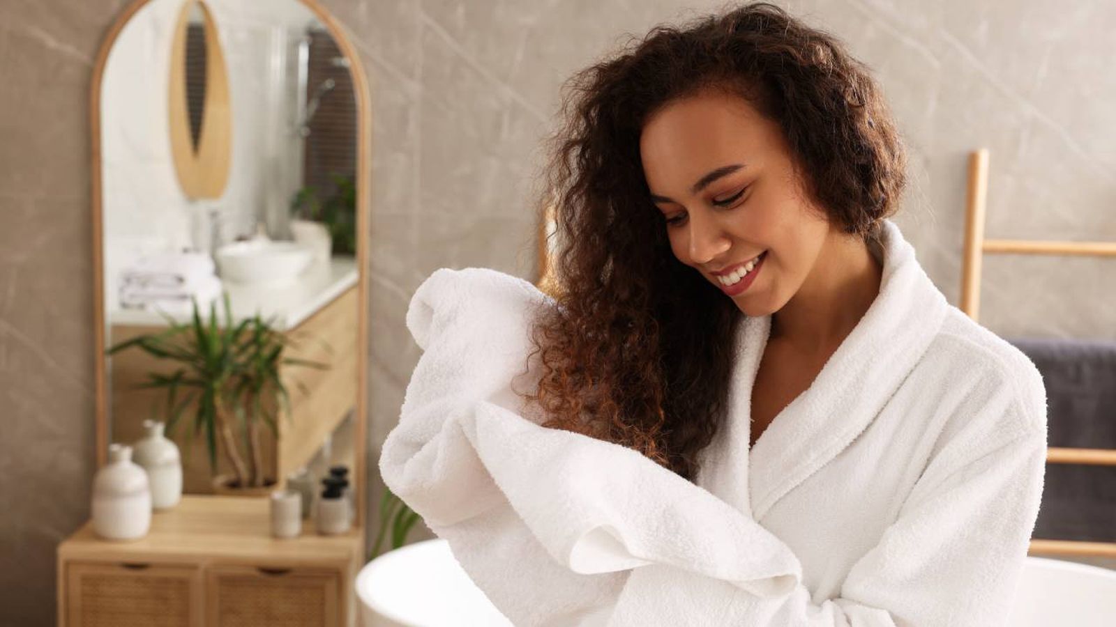 secar pelo toalla aire libre