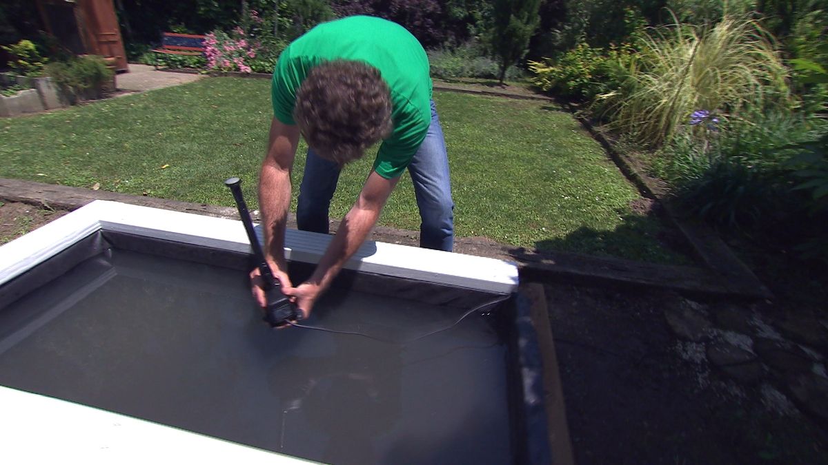 Estanque con traviesas paso 11