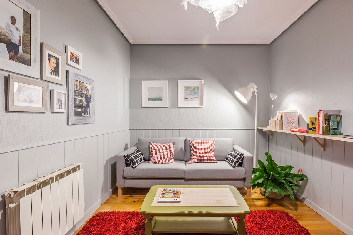 Decorar sala cálida y acogedora en gris