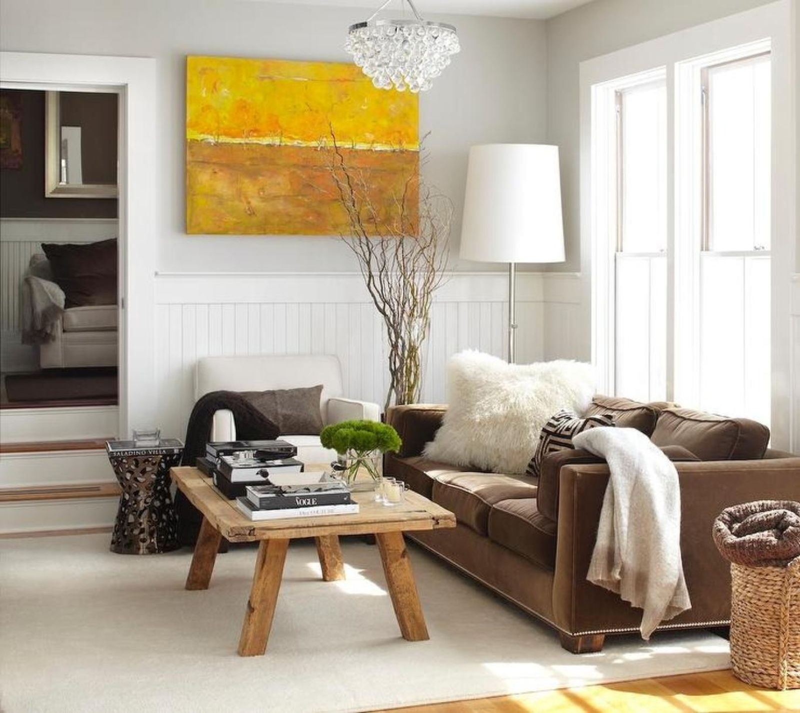 Salón con un toque rústico y combinación de textural.