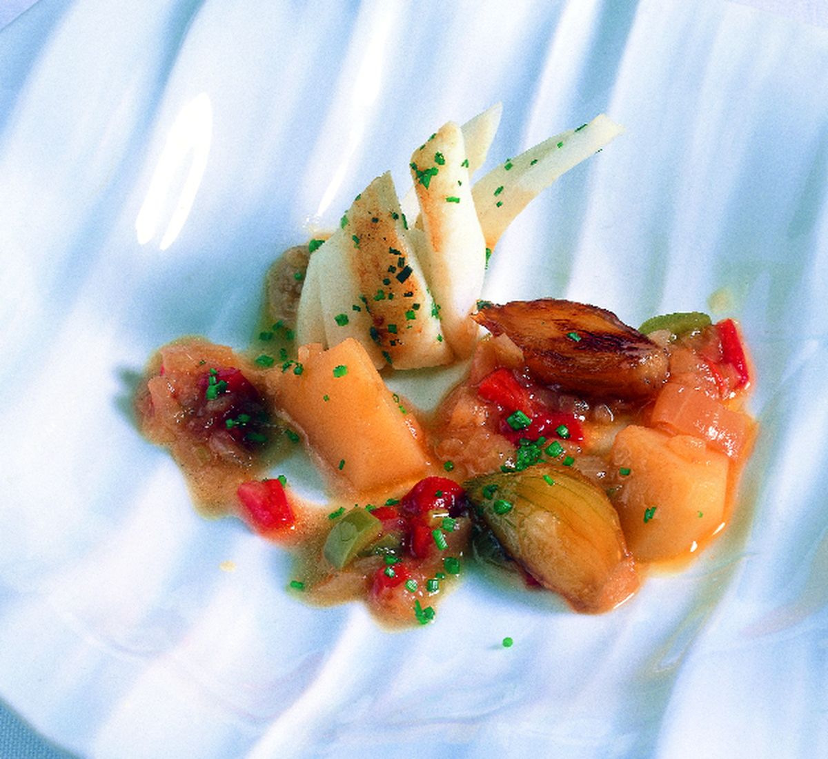 Marmitako de chipirones y chalotas confitadas