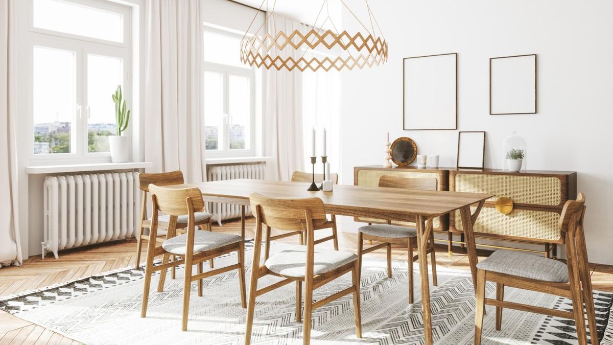 Comedor elegante y minimalista con mesa de madera rectangular.