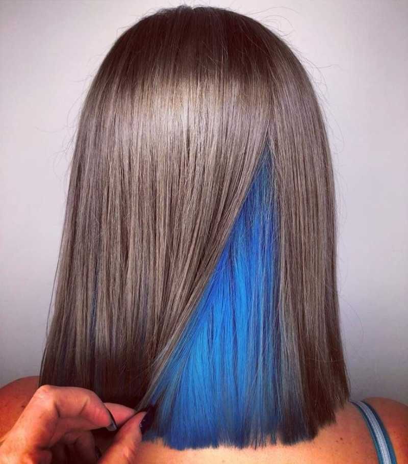 Teñido bajo la capa superior del cabello también llamado underlights