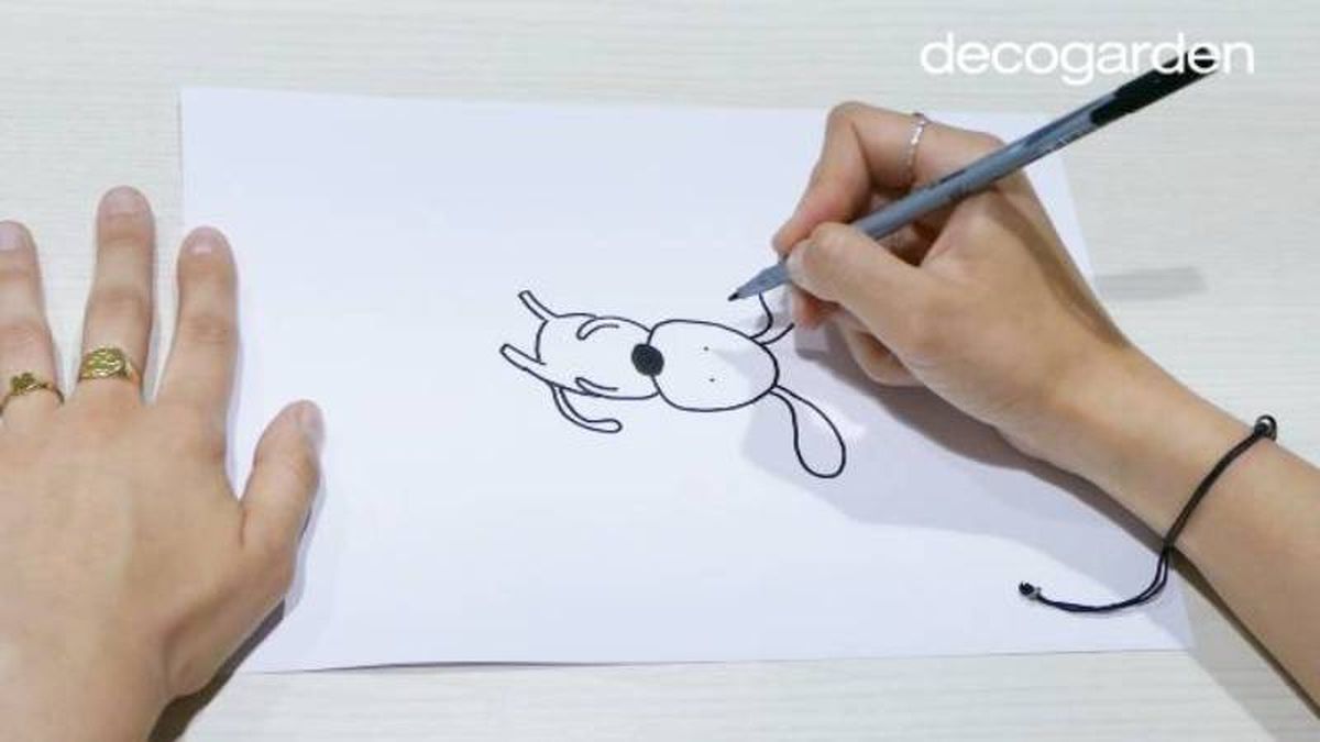 Paso 3 para dibujar un perro panza arriba.