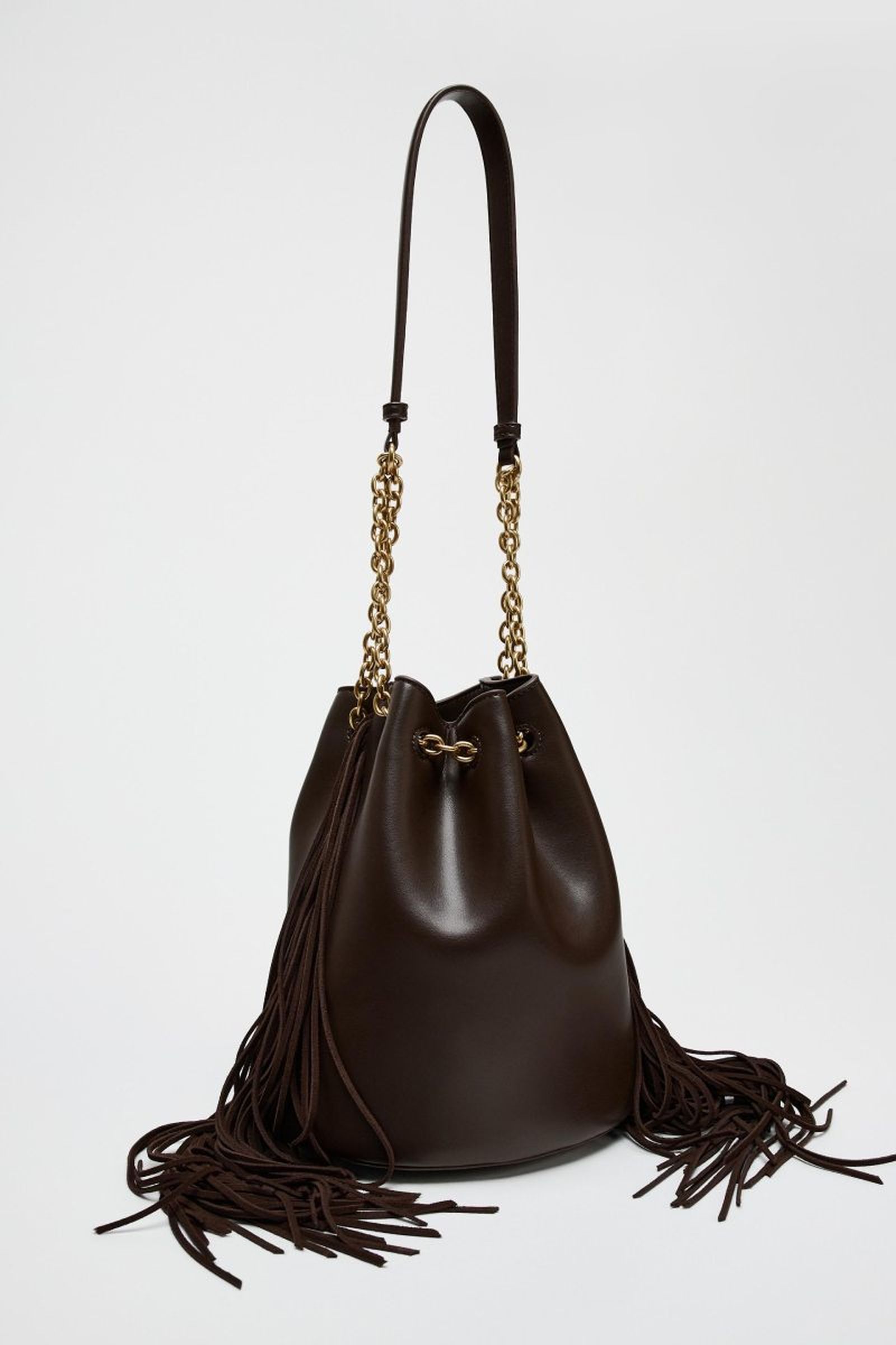 Bolso marrón con flecos en piel vacuna