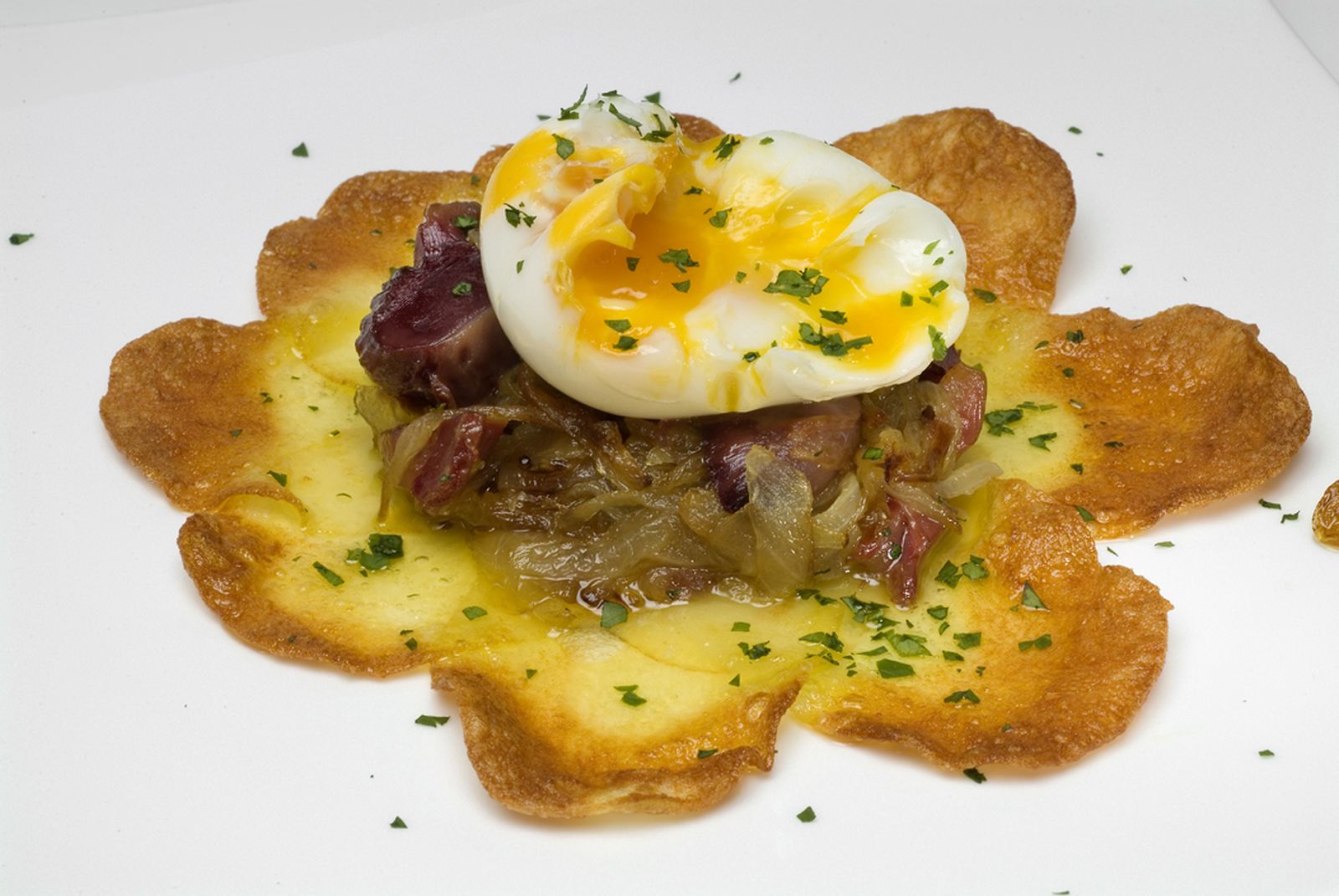 mollejas de pato sobre torta de patata xl