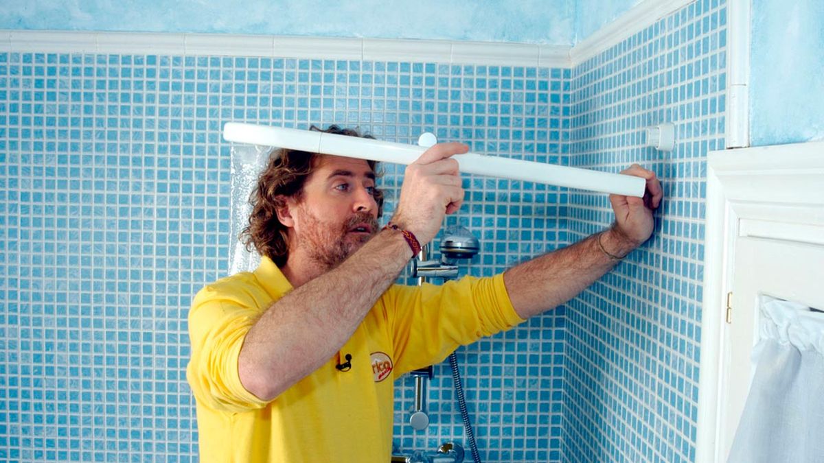 Columna de ducha con mampara paso 1