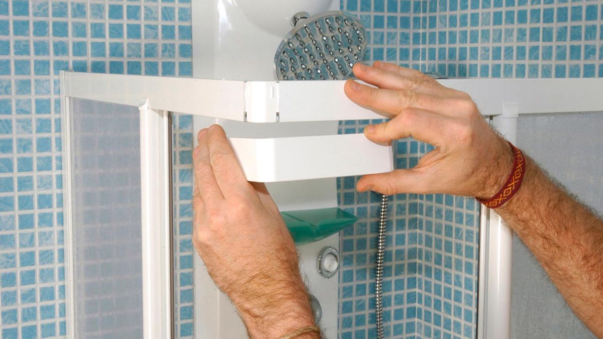 Columna de ducha con mampara paso 11