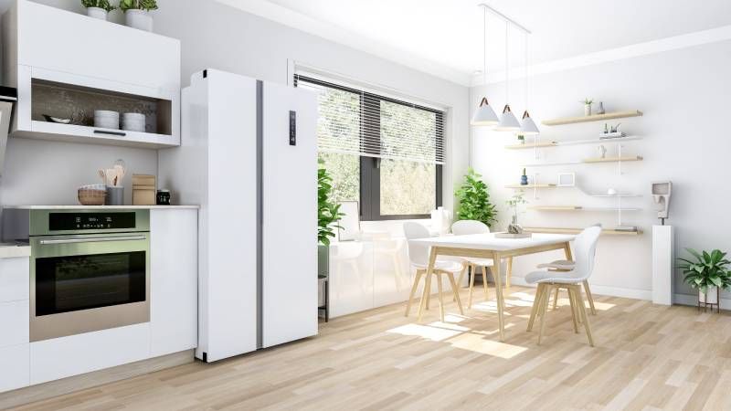 Cocina minimalista abierta al comedor.