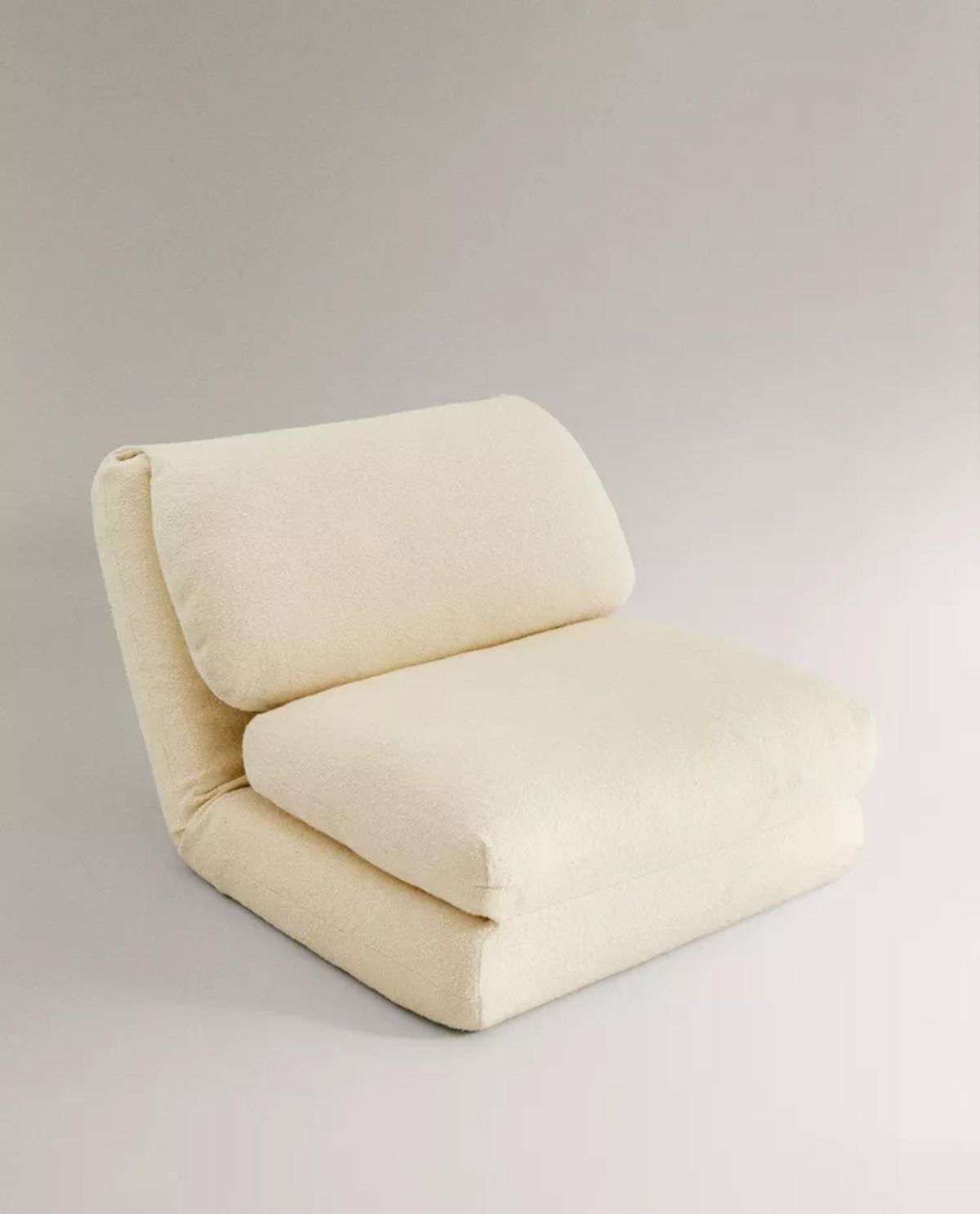 Sillón plegable individual Bouclé.